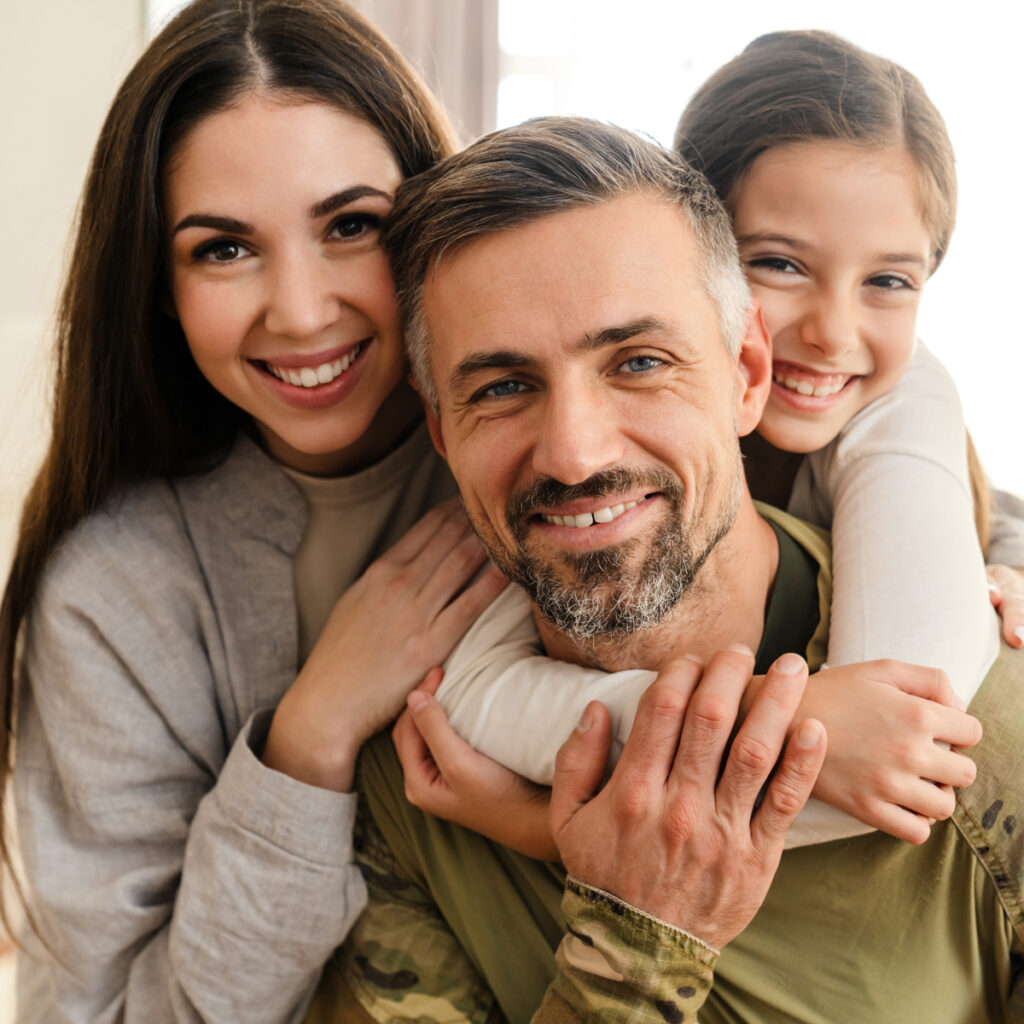 Happy father with 2 daughters